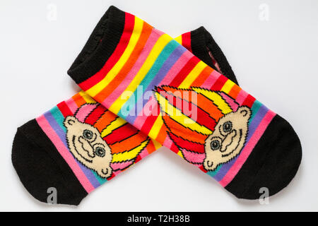 Pair of bright colourful Good Luck Trolls ankle socks isolated on white background Stock Photo