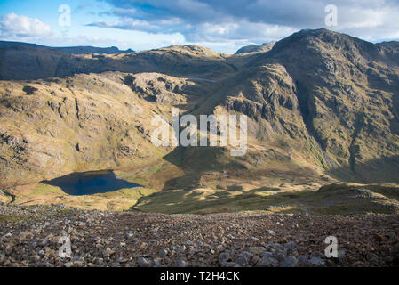 High view of Styhead Tarn  located in the Lake District National Park in the County of Cumbria,North West England,UK. Stock Photo