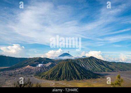 Bromo mountain , day time with dramatic cloud on blue sky Stock Photo