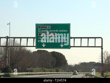 road junction in the italian highway and indications to ROME or Civitavecchia city and other italian place Stock Photo