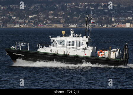 SD Clyde Racer, an Admiralty pilot vessel based on the Firth of Clyde, passing Greenock during the arrival stages of Exercise Joint Warrior 19-1. Stock Photo