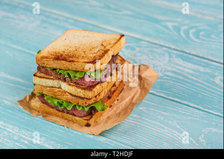 sandwich katsu sando with beef steak. wagyu katsu. japanese cuisine traditional food. Trendy healthy fast food snack Stock Photo