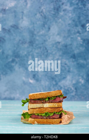 sandwich katsu sando with beef steak. wagyu katsu. japanese cuisine traditional food. Trendy healthy fast food snack. vertical Stock Photo