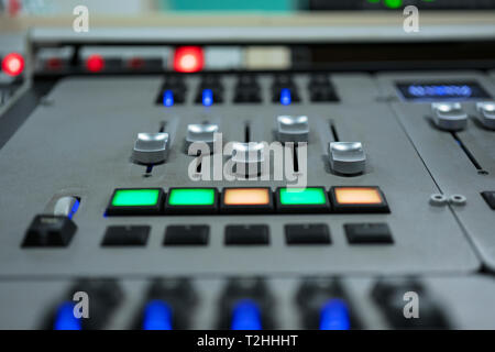 mixing console fader. music and light production, broadcasting concept Stock Photo