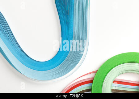 top view of wavy rainbow paper lines on white background Stock Photo