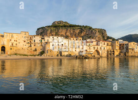 The old town of Cefalu with Rocca di Cefalu in the background, Cefalu, Sicily, Italy, Europe Stock Photo