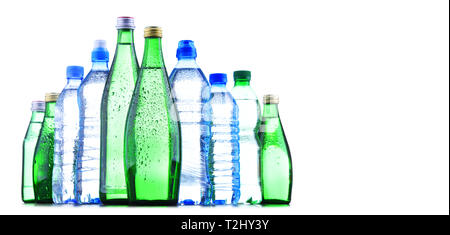 Composition with different sorts of bottles containing mineral water isolated on white Stock Photo
