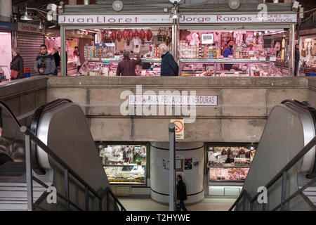 butcher shops on ground level above fish shops in basement in the mercado central, the central market hall in the city of Alicante, Spain Stock Photo