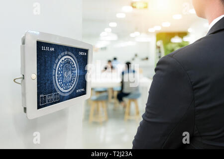 Machine learning systems technology , accurate facial recognition biometric technology and artificial intelligence concept. Worker check in job office Stock Photo