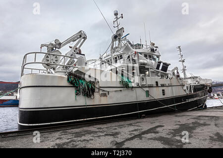 Old fishing vessel Sjarmor (Sjarmør, built 1993) moored at Damsgaardsundet, in the port of Bergen, Norway. Stock Photo