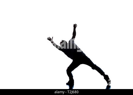 Modern man doing break dance routine Stock Photo