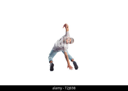 Fit man doing amazing dance exercise Stock Photo