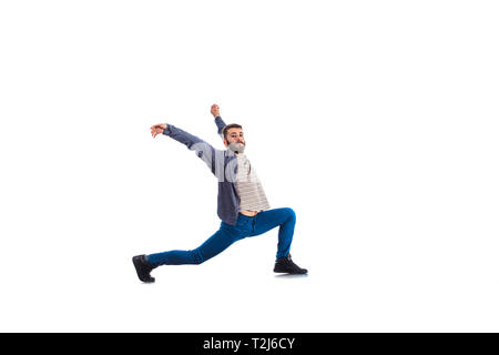 An urban guy is doing breakdance in the studio Stock Photo