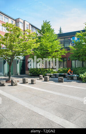 Concrete blocks in front of storefronts in the Seattle International District. Stock Photo