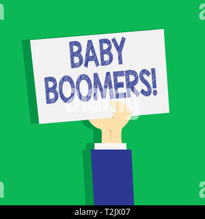 Text sign showing Baby Boomers. Business photo text demonstrating who is born in years following Second World War Clipart of Hand Holding Up Blank She Stock Photo
