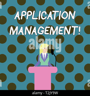 Word writing text Application Management. Business photo showcasing analysisaging applications throughout their lifecycle Businesswoman Standing Behin Stock Photo