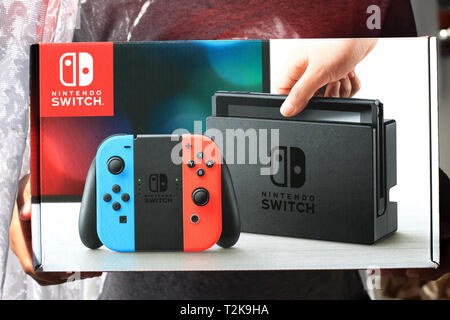 Nintendo Switch video game console developed by Nintendo, released on March  3, 2017 on a white background. Germany, Berlin - June 30, 2019: Nintendo  Switch Joy-con controller on a white background Stock Photo