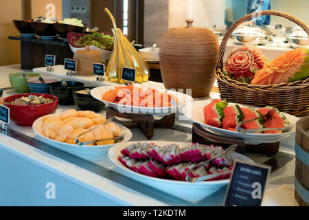 Buffet meal at a hotel, continental breakfast, friuts and yogurt on the table Stock Photo