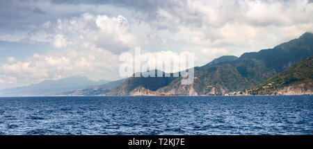 View of Dominica coastline from ferry to Martinique. Stock Photo