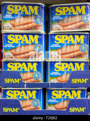 Stacked tins of Hormel Foods Spam on a supermarket shelf in London, England, UK Stock Photo