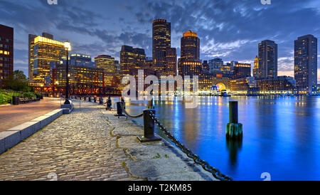 Boston skyline at night. Panoramic view of harbor and financial district Stock Photo