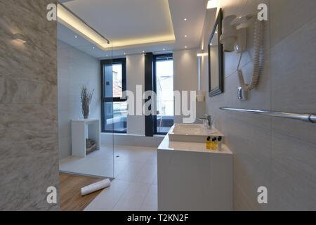 minimalistic bathrom in modern hotel with luxury details