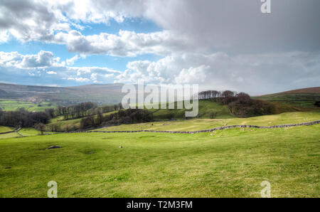 Rain clouds move in over farmland in the Peak District, England. Stock Photo