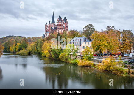 Autumn cityscape of Limburg an der Lahn with river and Limburg Cathedral, Hesse, Germany Stock Photo