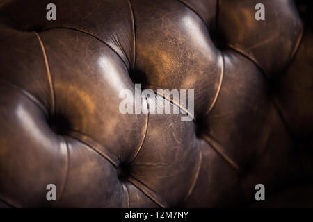 Close-up of an elegant vintage brown leather sofa Stock Photo