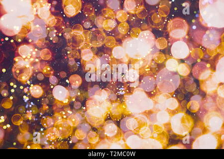 glittering shine bulbs lights background:blur of Christmas wallpaper  decorations concept.holiday festival backdrop:sparkle circle lit  celebrations dis Stock Photo - Alamy