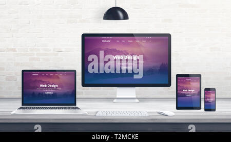 Web design, developer studio concept with responsive web page on multiple displays. Stock Photo