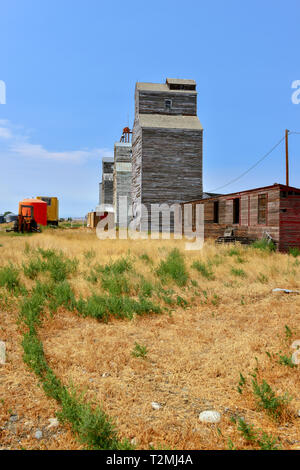 Old wooden grain elevator facility on the prairie in Montana, USA Stock Photo