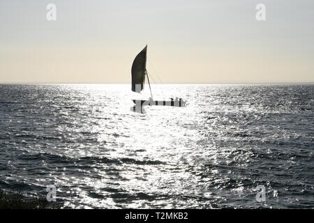 Local fishing dhow under sail. Quirimba Island, Quirimbas Archipelago, Mozambique, East Africa Stock Photo