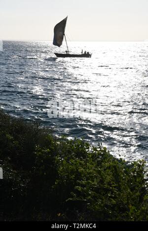 Local fishing dhow under sail. Quirimba Island, Quirimbas Archipelago, Mozambique, East Africa Stock Photo