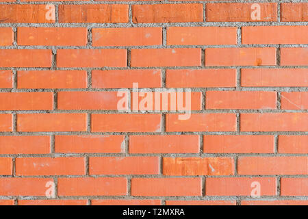 Colorful red and brown brick wall background in a Flemish stretcher bond pattern Stock Photo