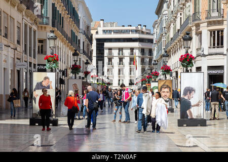 Malaga city centre - People shopping, Calle Marques de Larios Street scene,  Malaga Old town, Malaga, Andalusia Spain Stock Photo