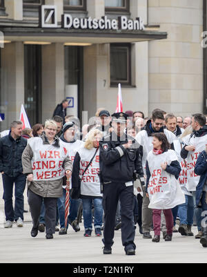 Hamburg, Germany. 03rd Apr, 2019. Employees of Hamburg banks demonstrate on Adolphplatz. The Verdi union has called for warning strikes at private and public banks. Credit: Axel Heimken/dpa/Alamy Live News Stock Photo