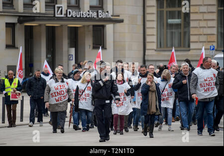 Hamburg, Germany. 03rd Apr, 2019. Employees of Hamburg banks demonstrate on Adolphplatz. The Verdi union has called for warning strikes at private and public banks. Credit: Axel Heimken/dpa/Alamy Live News Stock Photo