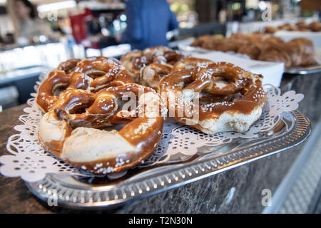 03 April 2019, Bavaria, München: Butter pretzels lie on a tray at a press appointment. Photo: Lino Mirgeler/dpa Stock Photo