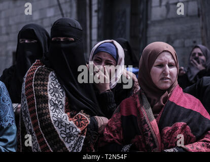 April 3, 2019 - Gaza, khan younis, Palestine - Relatives of the deceased are seen mourning during the funeral ceremony of Faris Abu Hijras, 26, who was killed by Israeli troops east of Khuza'a near the Israeli-Gaza border during the Palestinian Land Day demonstrations. (Credit Image: © Yousef Masoud/SOPA Images via ZUMA Wire) Stock Photo