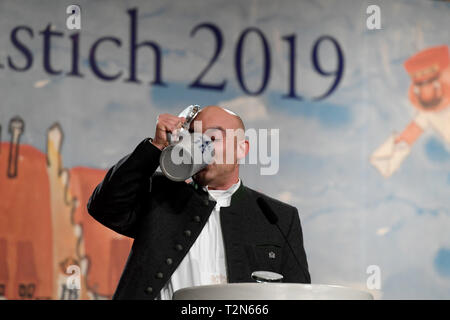03 April 2019, Bavaria, München: Django Asül, cabaret artist, speaks to invited guests at the Maibock tapping in the Hofbräuhaus. Photo: Felix Hörhager/dpa Stock Photo