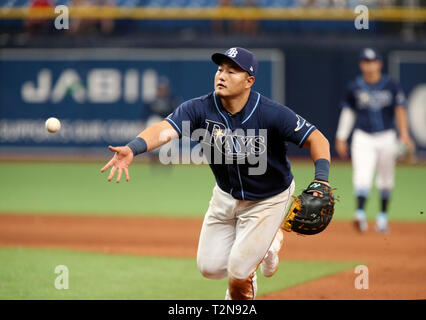 St. Petersburg, Florida, USA. 3rd Apr, 2019. DOUGLAS R. CLIFFORD | Times .Tampa Bay Rays first baseman Ji-Man Choi (26) shovels the ball to first on a play during the 11th inning of Wednesdays (1/3/19) game between the Tampa Bay Rays and the Colorado Rockies at Tropicana Field in St. Petersburg. Credit: Douglas R. Clifford/Tampa Bay Times/ZUMA Wire/Alamy Live News Stock Photo