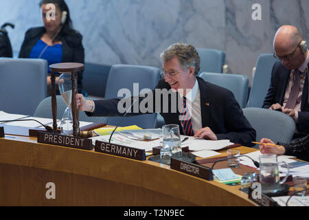 United Nations. 3rd Apr, 2019. German UN ambassador Christoph Heusgen (Front) holds an hourglass as he chairs a UN Security Council meeting on the situation in Haiti at the UN headquarters in New York, on April 3, 2019. UN Security Council looked and acted differently Wednesday with two visible changes -- perennially closed drapes were pulled open and an hourglass was placed on the table in front of the council president, German UN ambassador Christoph Heusgen, who wished to have the chamber 'enlightened.' Credit: Li Muzi/Xinhua/Alamy Live News Stock Photo