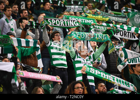 Lisbon, Portugal. 03rd Apr, 2019. Sporting supporters shows their club scarf   during second round of Portuguese Football Cup Semi-Finals against Benfica. Sporting won 1-0 against Benfica after losing first round 1-2 in Benfica Stadium. With this result Sporting it's in the Portuguese Cup Final, that will face Porto. Credit: SOPA Images Limited/Alamy Live News Stock Photo