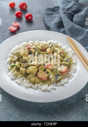 Thai red chicken curry with white rice Stock Photo