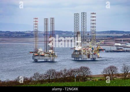 Moored platforms FON and Baug in Cromarty Firth near Cromarty Black Isle Highland Scotland UK Stock Photo