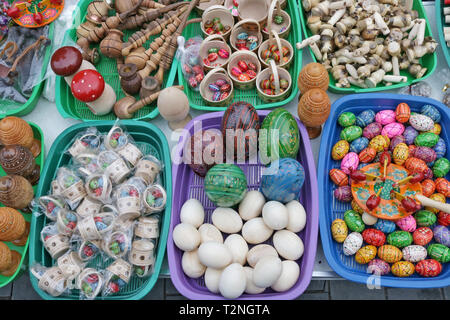 VILNIUS, LITHUANIA - MARCH 02, 2019: Traditional Lithuanian  homemade  wooden Easters eggs and gifts  are sold on streets during the spring Kaziukas f Stock Photo