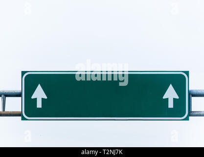 Green blank highway sign isolated on white. Stock Photo