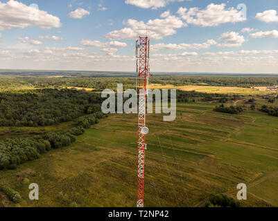 Cell tower in the forest, view from the drone Stock Photo