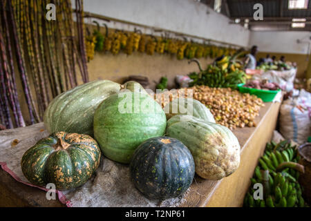 Various squash sitting out for sale at outdoor market, Rwanda Farmers Market, in Rwanda Stock Photo